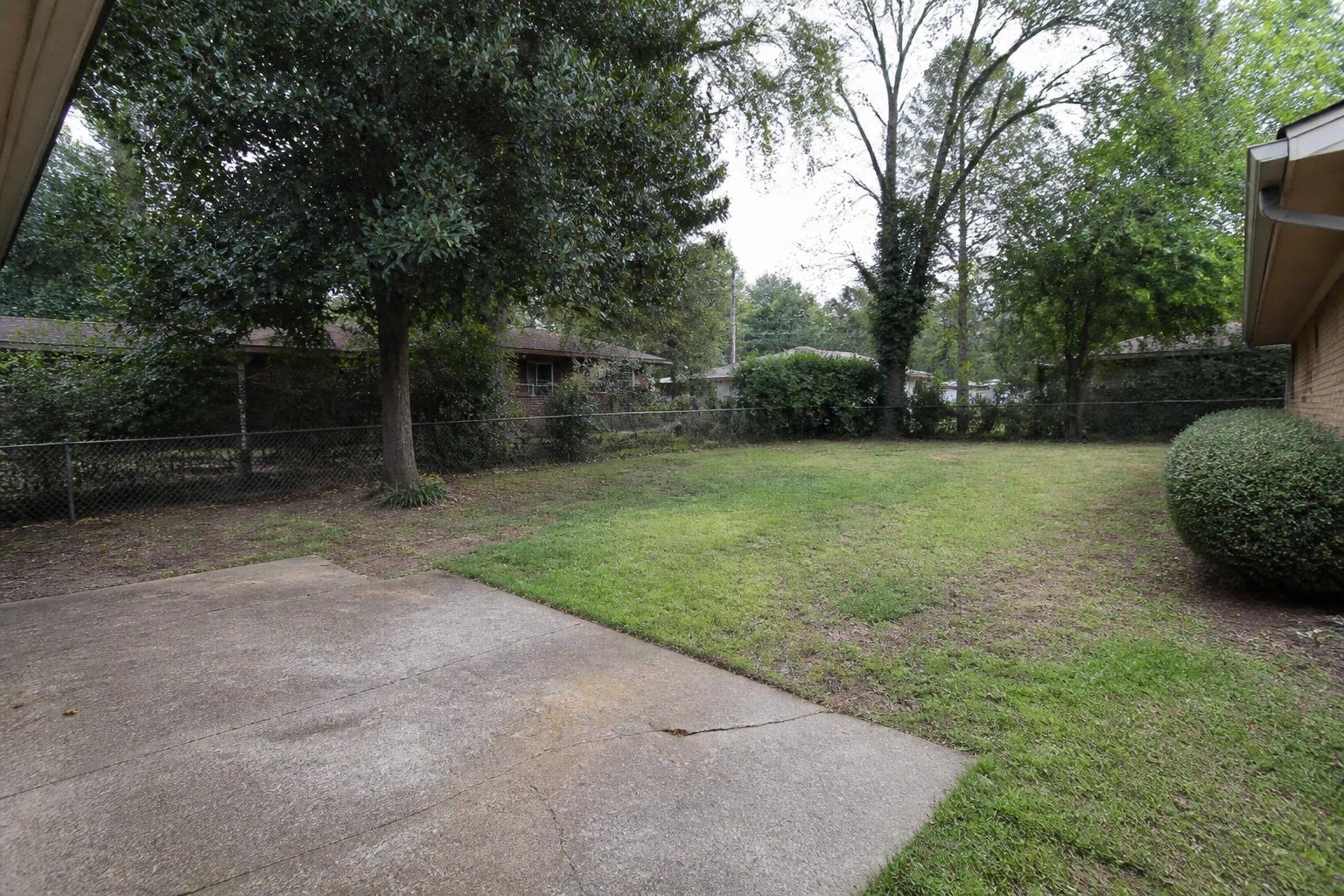 Backyard Outdoor Living Oasis — illustrative before concept